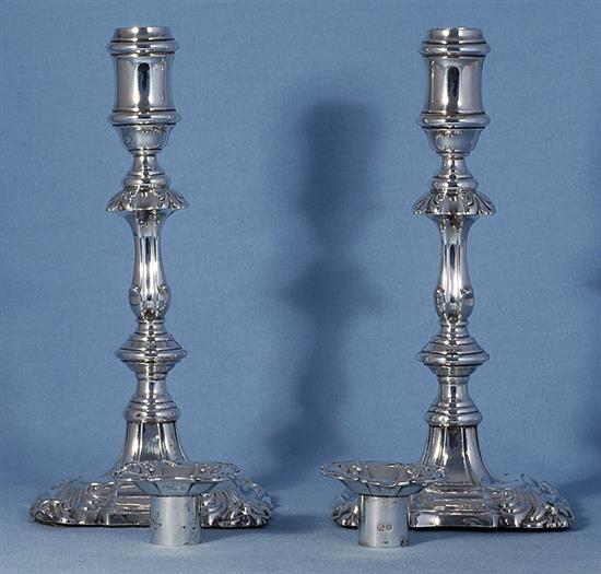 A pair of Edwardian silver candlesticks, Height 240mm, weighted.